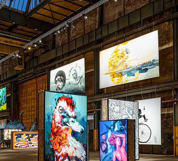 Straat Museum Amsterdam interior with vibrant street art displays.