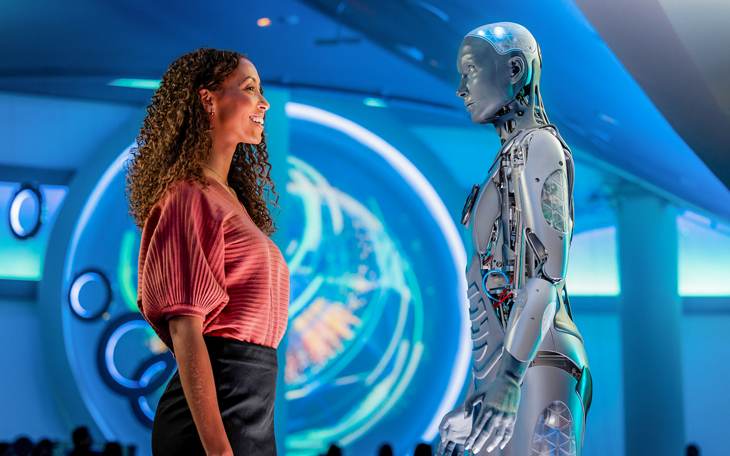Visitor interacting with a humanoid robot at Sphere, Las Vegas.