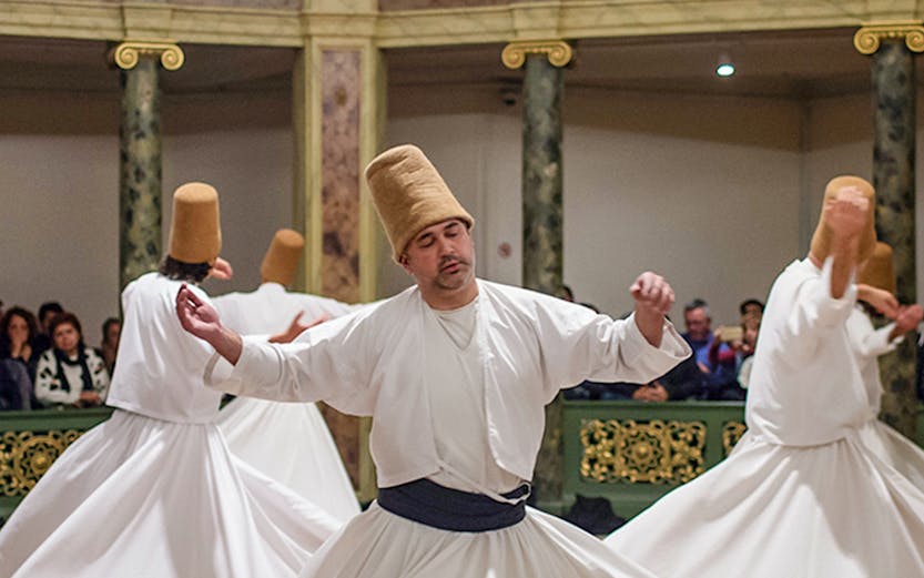 Whirling Dervishes performing traditional dance in Istanbul, Turkey.