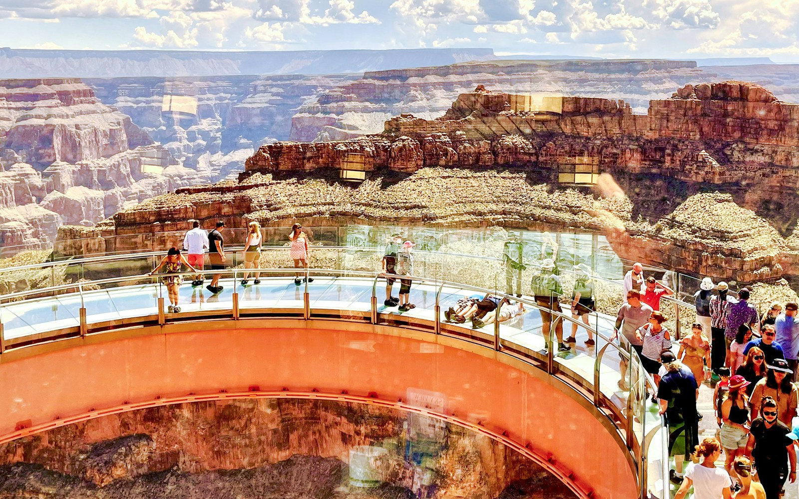 Grand Canyon Skywalk extending over canyon with tourists viewing landscape, near Hoover Dam, Las Vegas.