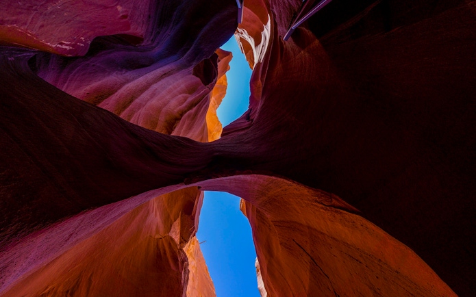 Canyon rock formations with blue sky in Deer Canyon, Arizona.