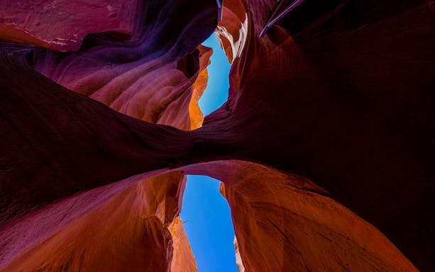 Canyon rock formations with blue sky in Deer Canyon, Arizona.