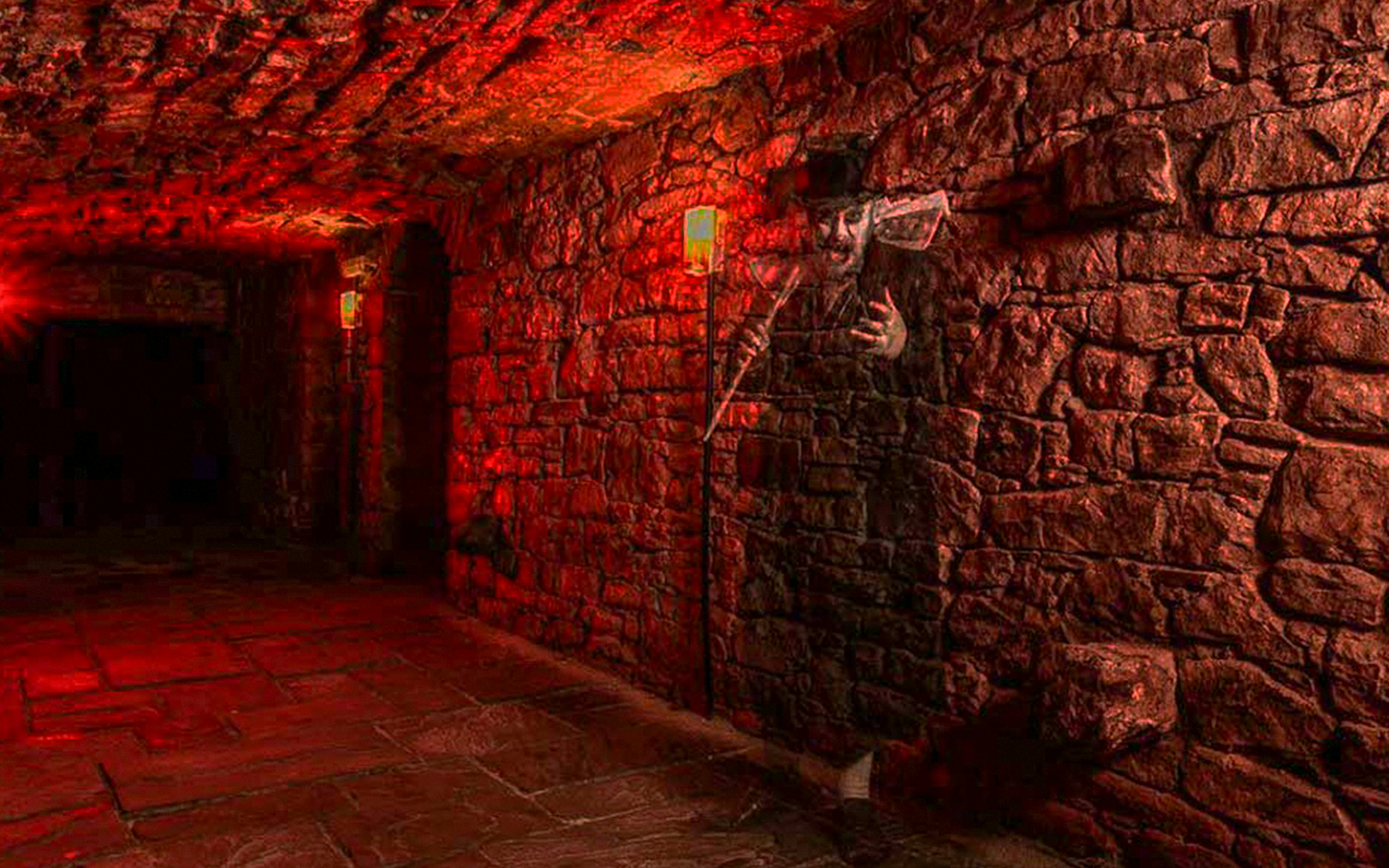Underground stone corridor with ghostly figure on a famous ghost tour.