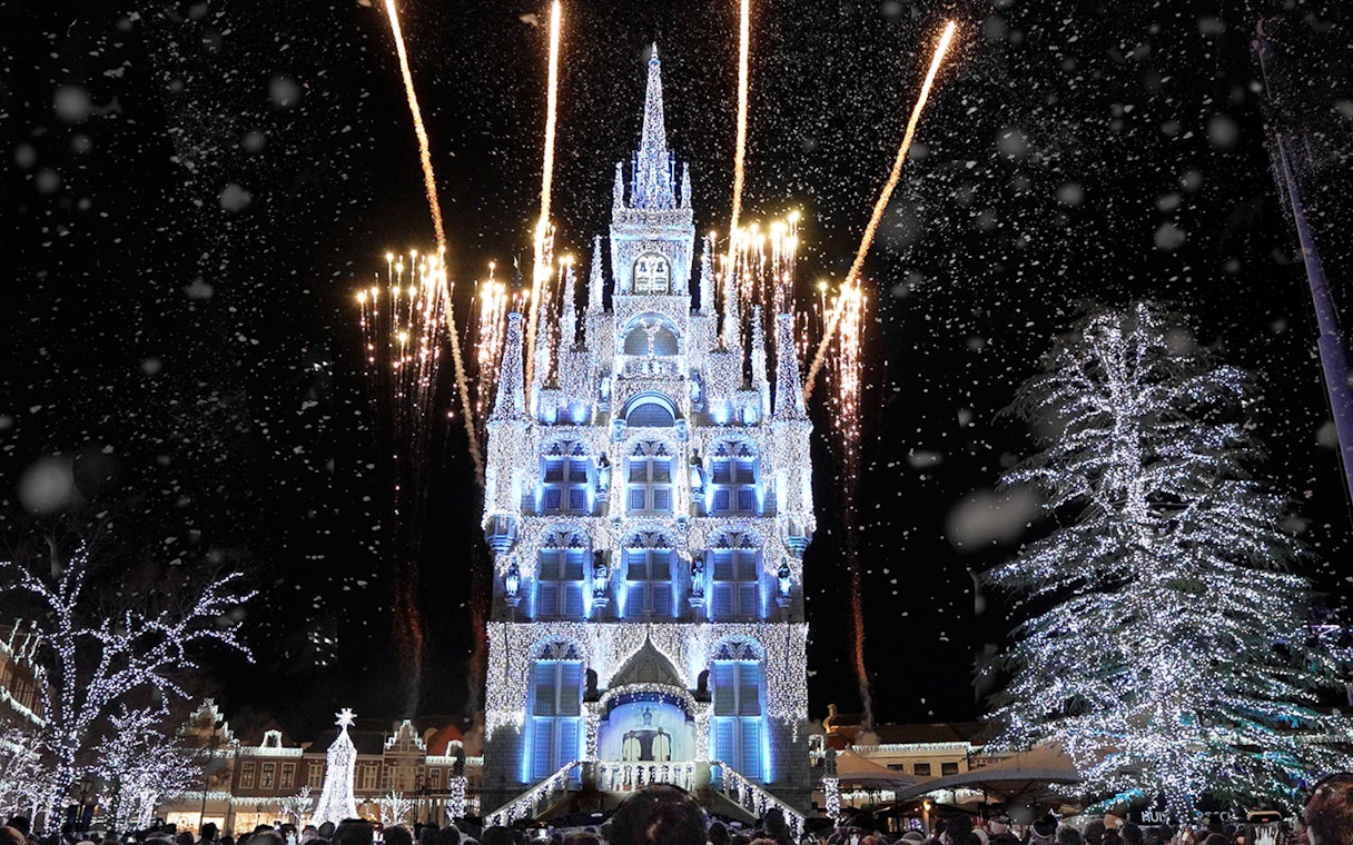 Fireworks illuminate Huis Ten Bosch castle at night, Nagasaki, Japan.