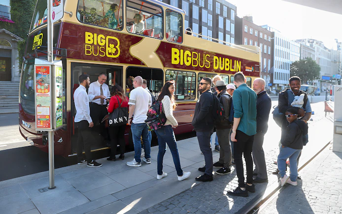 People boarding Big Bus hop-on hop-off tour in Dublin.