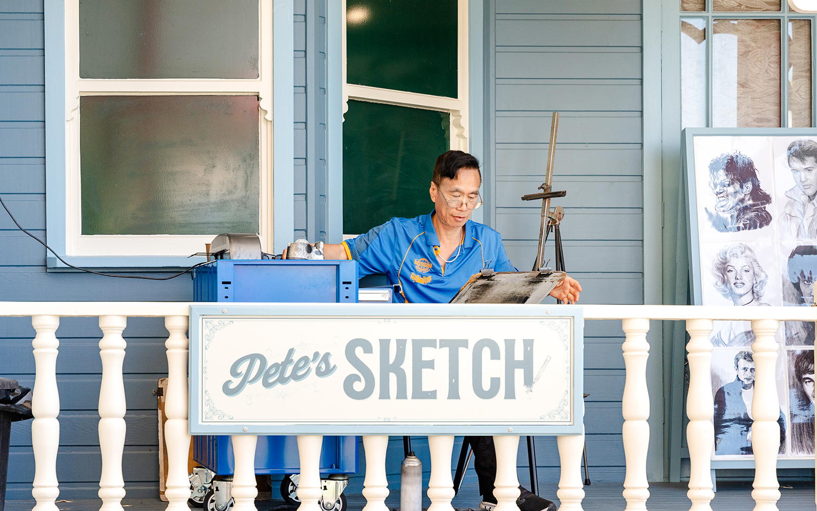 Pete's Sketch at Dreamworld theme park entrance with colorful architecture and lively visitors.