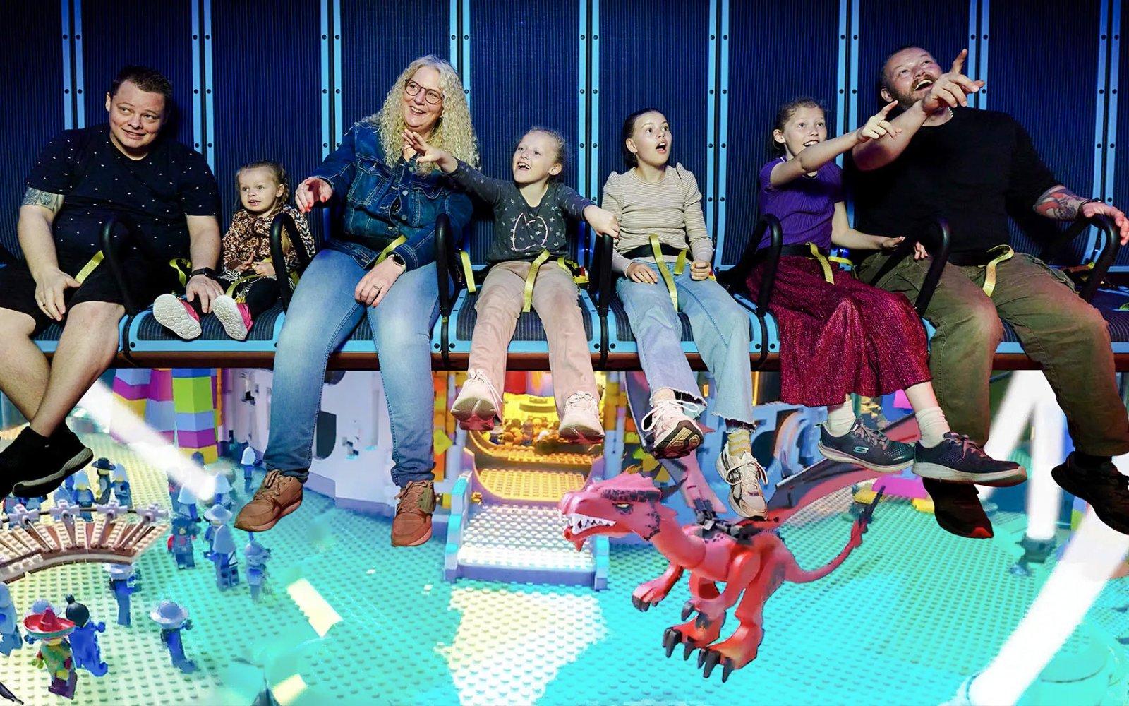 Guests on a ride at THE LEGO MOVIE World in LEGOLAND Billund.