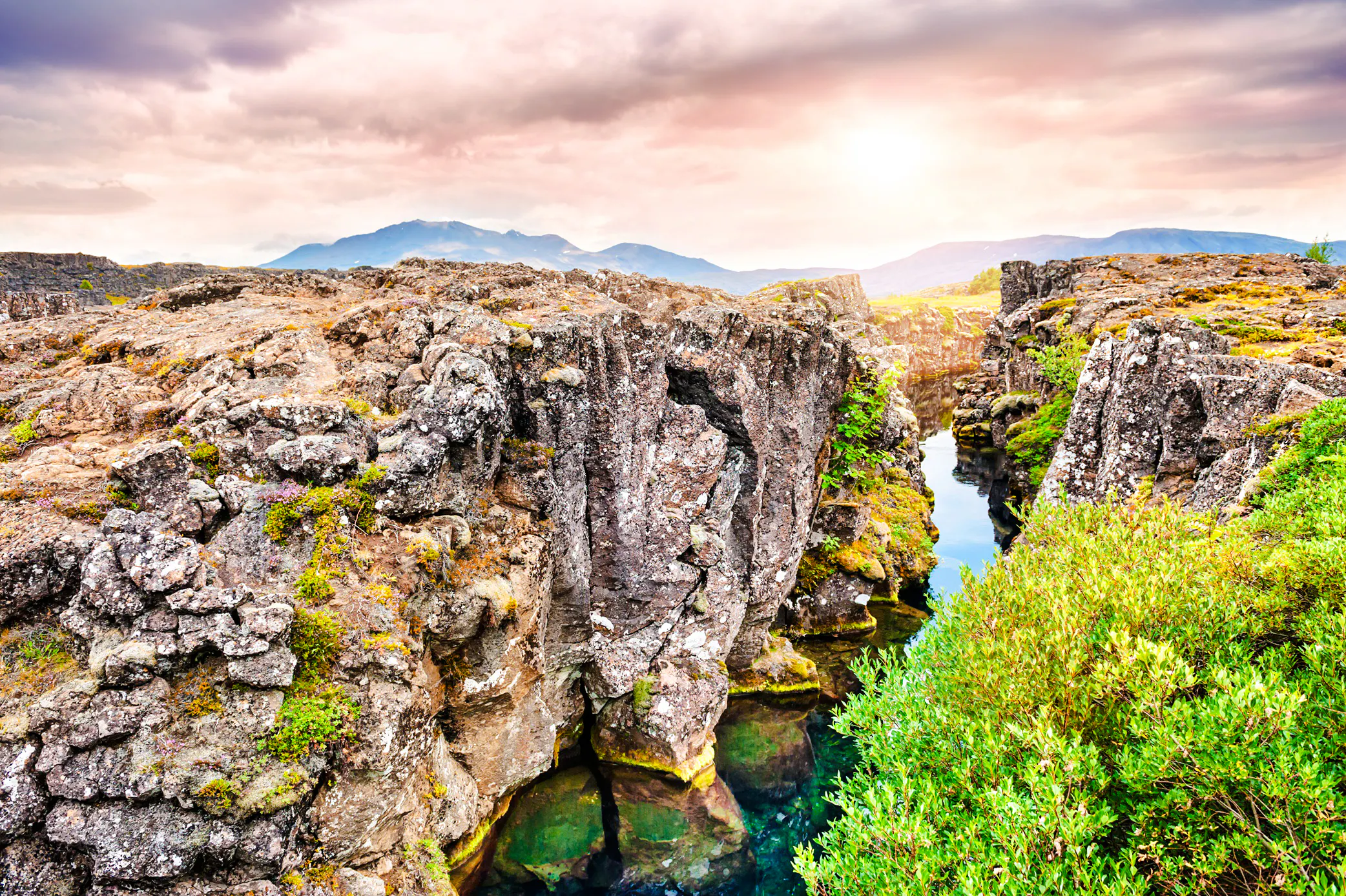 Rugged cliffs and clear water at Þingvellir National Park, part of the Golden Circle tour, Reykjavik.