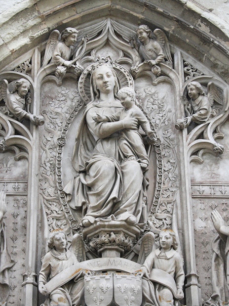 Royal Amboise Castle stone relief with religious figures and intricate carvings.