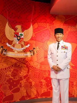 Wax figure in military attire at Madame Tussauds Bangkok with Indonesian emblem.