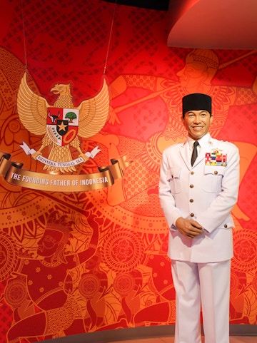 Wax figure in military attire at Madame Tussauds Bangkok with Indonesian emblem.