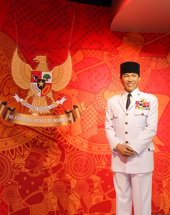 Wax figure in military attire at Madame Tussauds Bangkok with Indonesian emblem.