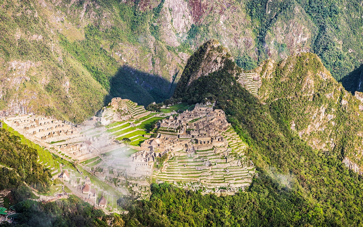 Panoramic view of Machu Picchu ruins from Sun Gate, Peru.