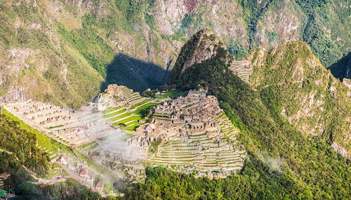 Panoramic view of Machu Picchu ruins from Sun Gate, Peru.