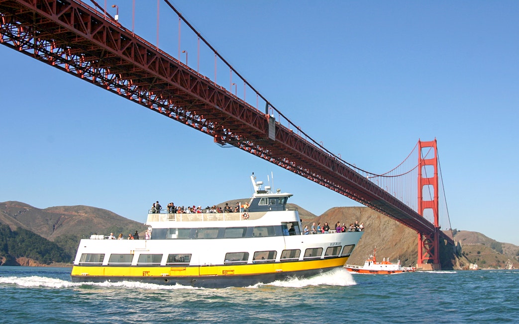 Cruise ship under Golden Gate Bridge during Alcatraz Tour, San Francisco Bay.