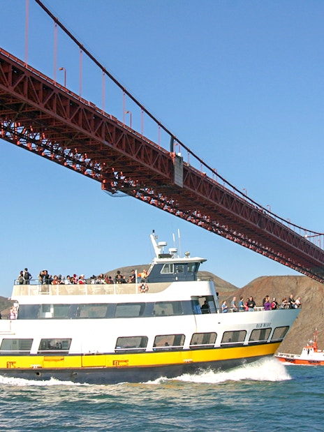 Cruise ship under Golden Gate Bridge during Alcatraz Tour, San Francisco Bay.