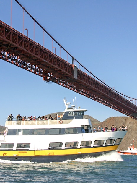 Cruise ship under Golden Gate Bridge during Alcatraz Tour, San Francisco Bay.