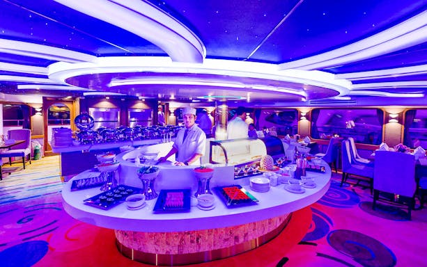 Chef preparing dishes on Wonderful Pearl Candle Light Dinner Cruise.