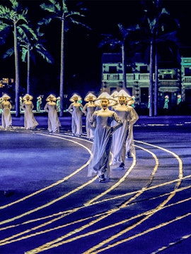 Performers in traditional attire during Hoi An Memories Show, Vietnam.
