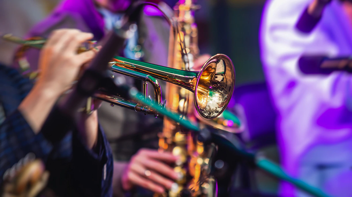 Musicians playing brass instruments at Nice Jazz Festival.