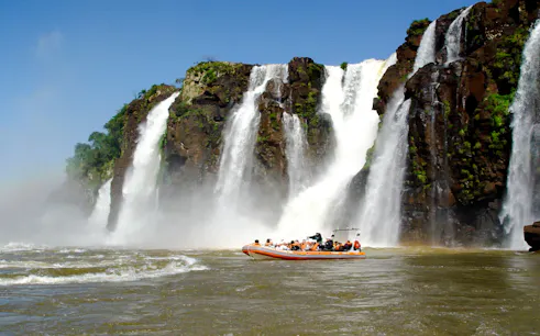 Boat approaching Iguazu Falls on Macuco Safari Tour, Foz do Iguaçu, Brazil.