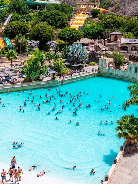 Visitors enjoying the wave pool at Discovery Island, Aqualand Maspalomas.