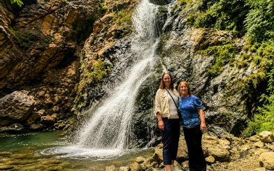 Visitors at a waterfall in Ourika Valley, Atlas Mountains, Marrakech.