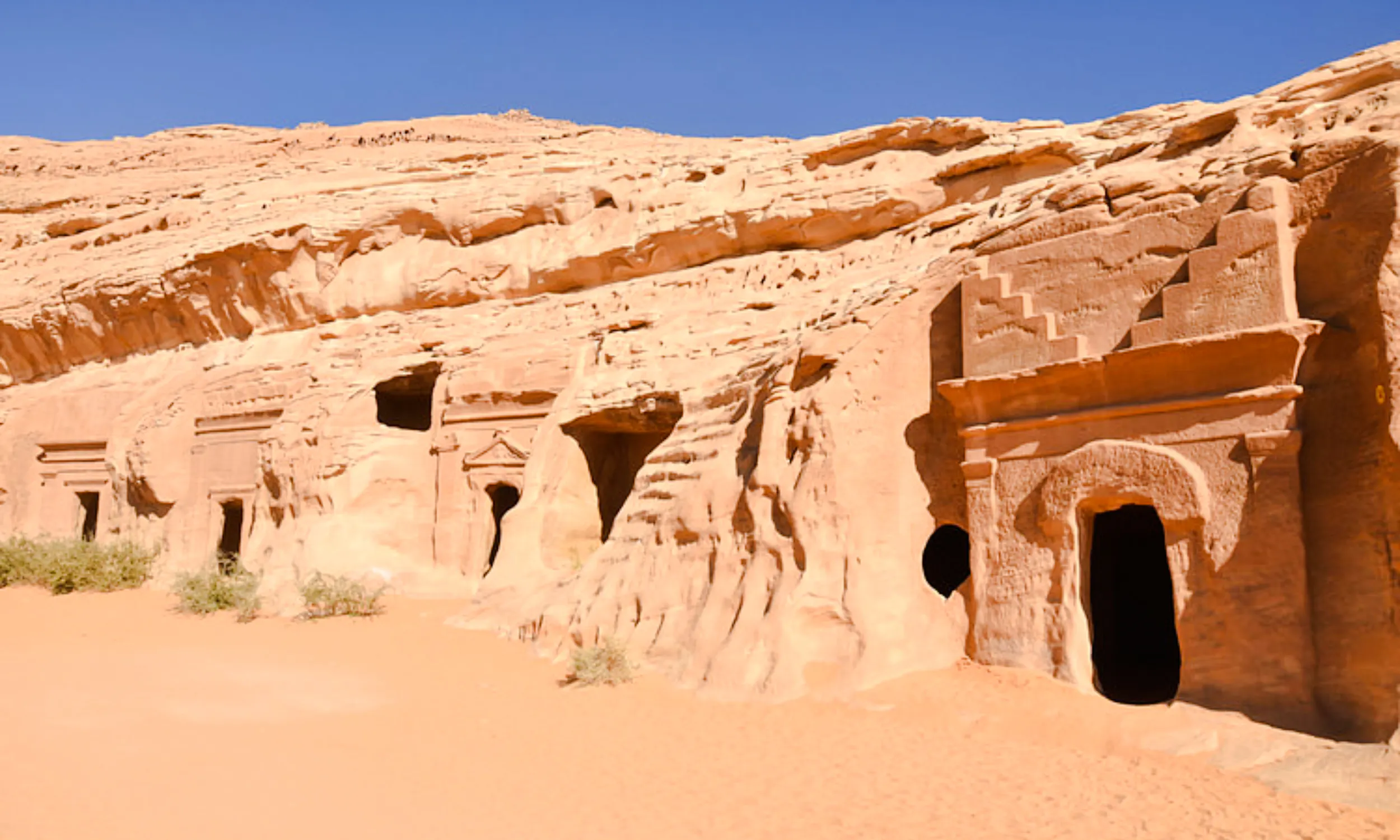 Ancient rock-cut tombs in AlUla, Saudi Arabia, part of a private 2-day tour from Madinah.