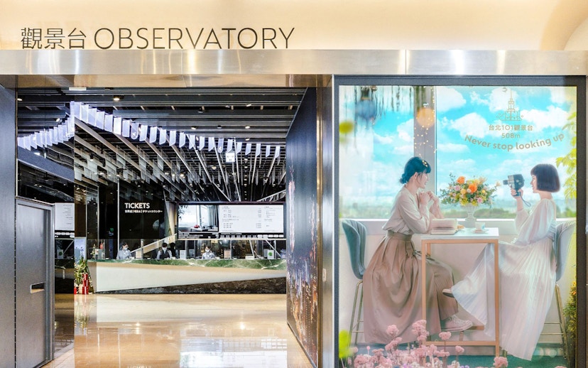 Taipei 101 Observatory entrance with ticket counter and promotional display.