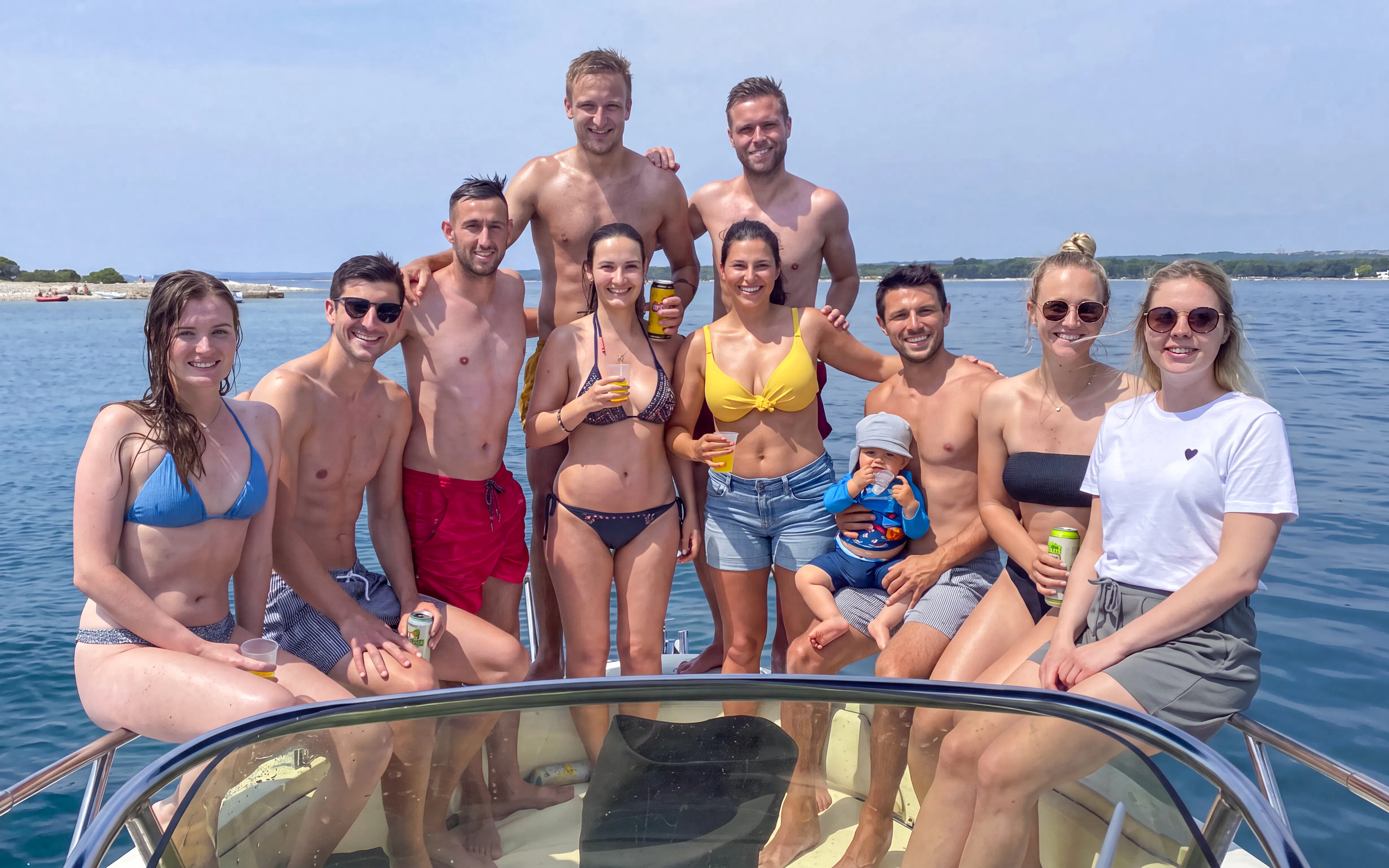 Group enjoying a boat tour near Brijuni Islands, Croatia.