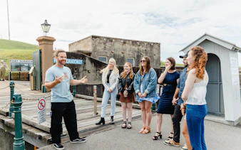 Tour guide with group at Fort Scratchley, Newcastle.