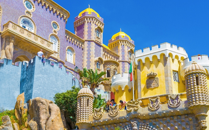 Pena Palace's colorful towers and intricate architecture in Sintra, Lisbon, Portugal.