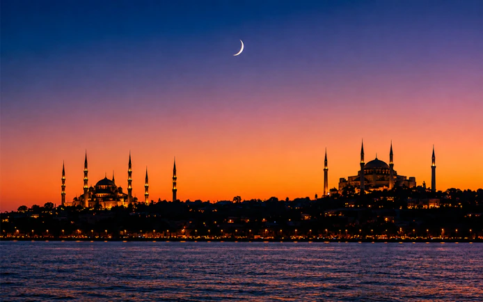 Sunset view of Istanbul skyline with mosques, highlighting the Galata Tower Experience.