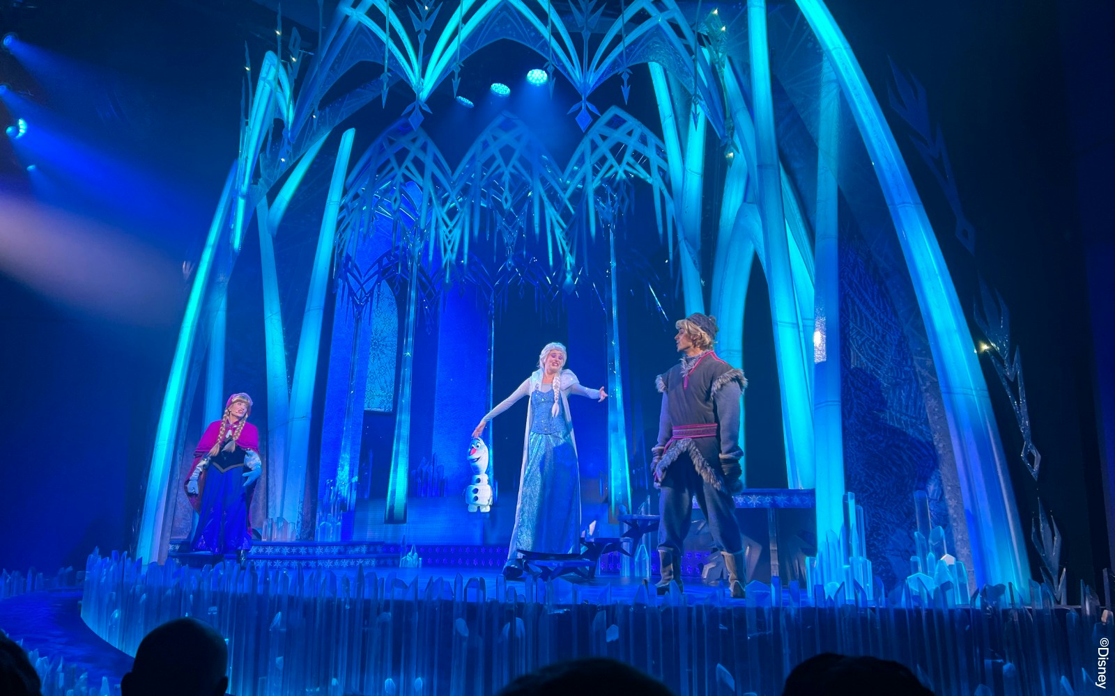 Elsa and Anna performing on stage at Disneyland Paris Animagique Theatre during Frozen: A Musical Invitation.