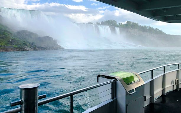 Boat view approaching Niagara Falls on the USA side during a tour.
