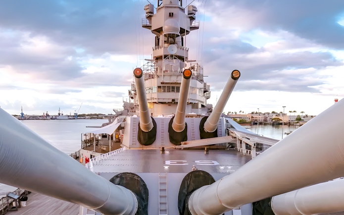 USS Missouri battleship deck with large naval guns, Pearl Harbor, Hawaii.