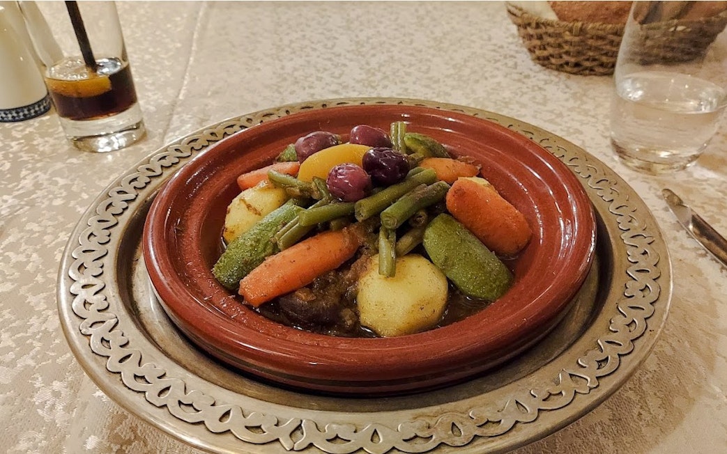 Moroccan tagine with vegetables served at Sky 28 lounge bar, Kenzi Tower Hotel, Casablanca.