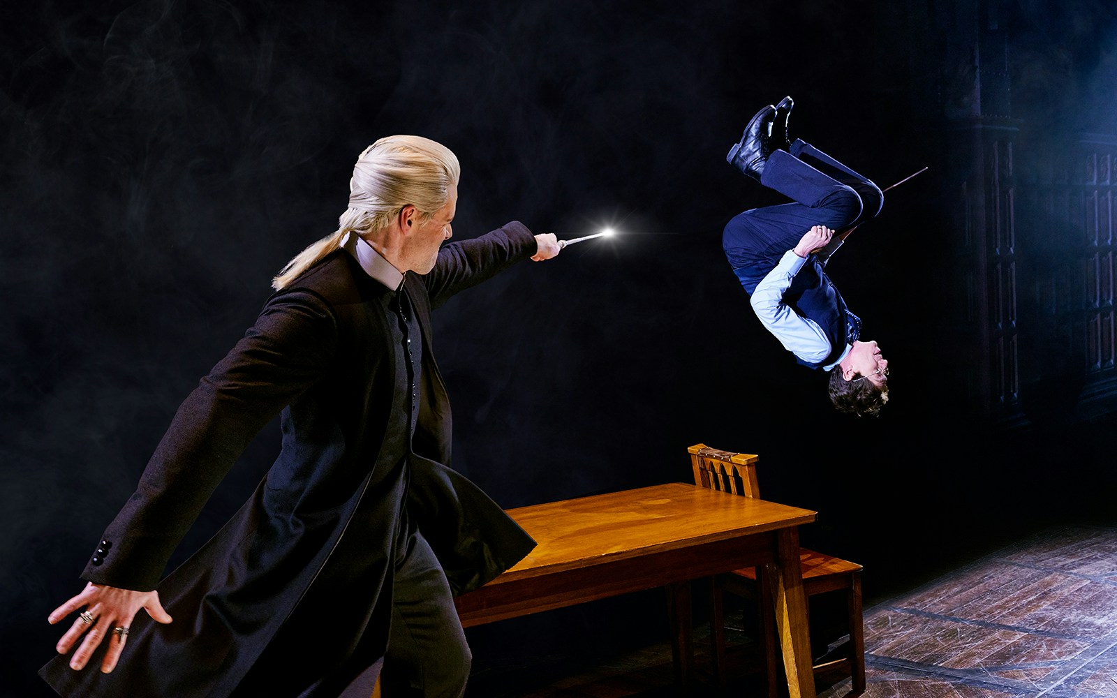 Wizard casting spell in "Harry Potter and the Cursed Child" stage scene.