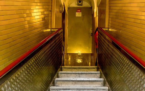 Stairway leading to a door inside St. Peter's Basilica, Vatican City.