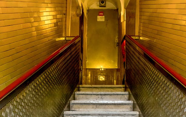 Stairway leading to a door inside St. Peter's Basilica, Vatican City.