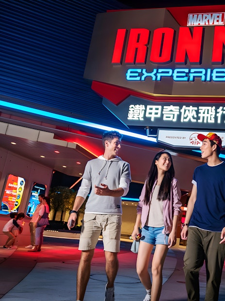 Visitors walking outside Iron Man Experience at Hong Kong Disneyland.
