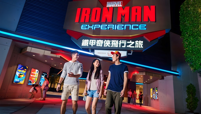 Visitors walking outside Iron Man Experience at Hong Kong Disneyland.