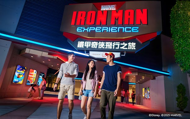 Visitors walking outside Iron Man Experience at Hong Kong Disneyland.