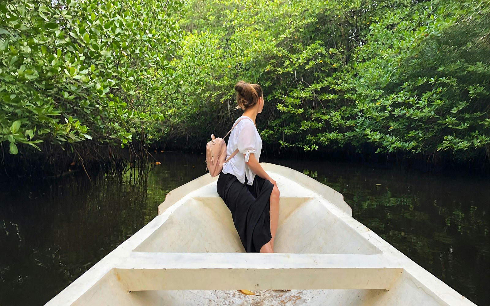Boat ride through mangroves on Nusa Lembongan during snorkeling day tour.