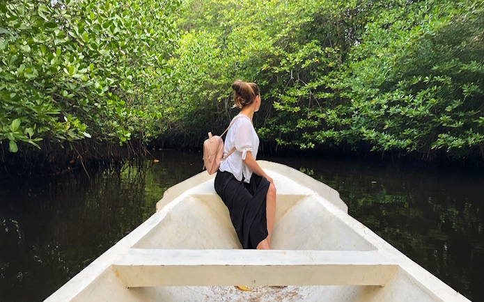Boat ride through mangroves on Nusa Lembongan during snorkeling day tour.