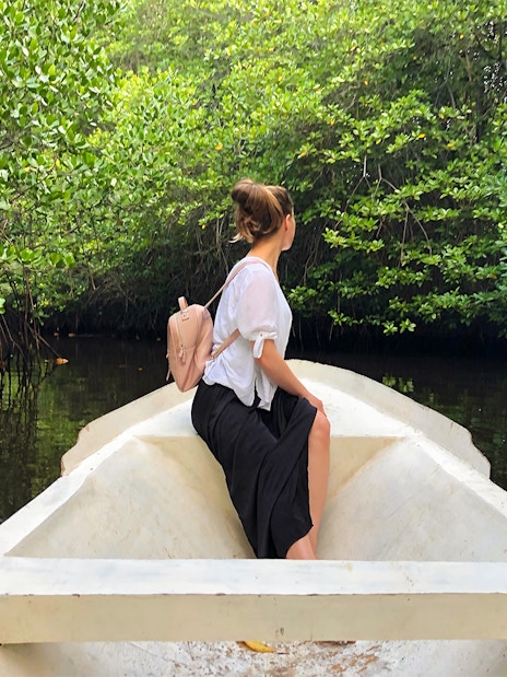 Boat ride through mangroves on Nusa Lembongan during snorkeling day tour.