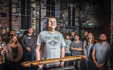 Visitors watching a performance at Hamburg Dungeon.
