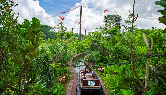 Boat ride through lush greenery at Safari World Bangkok.