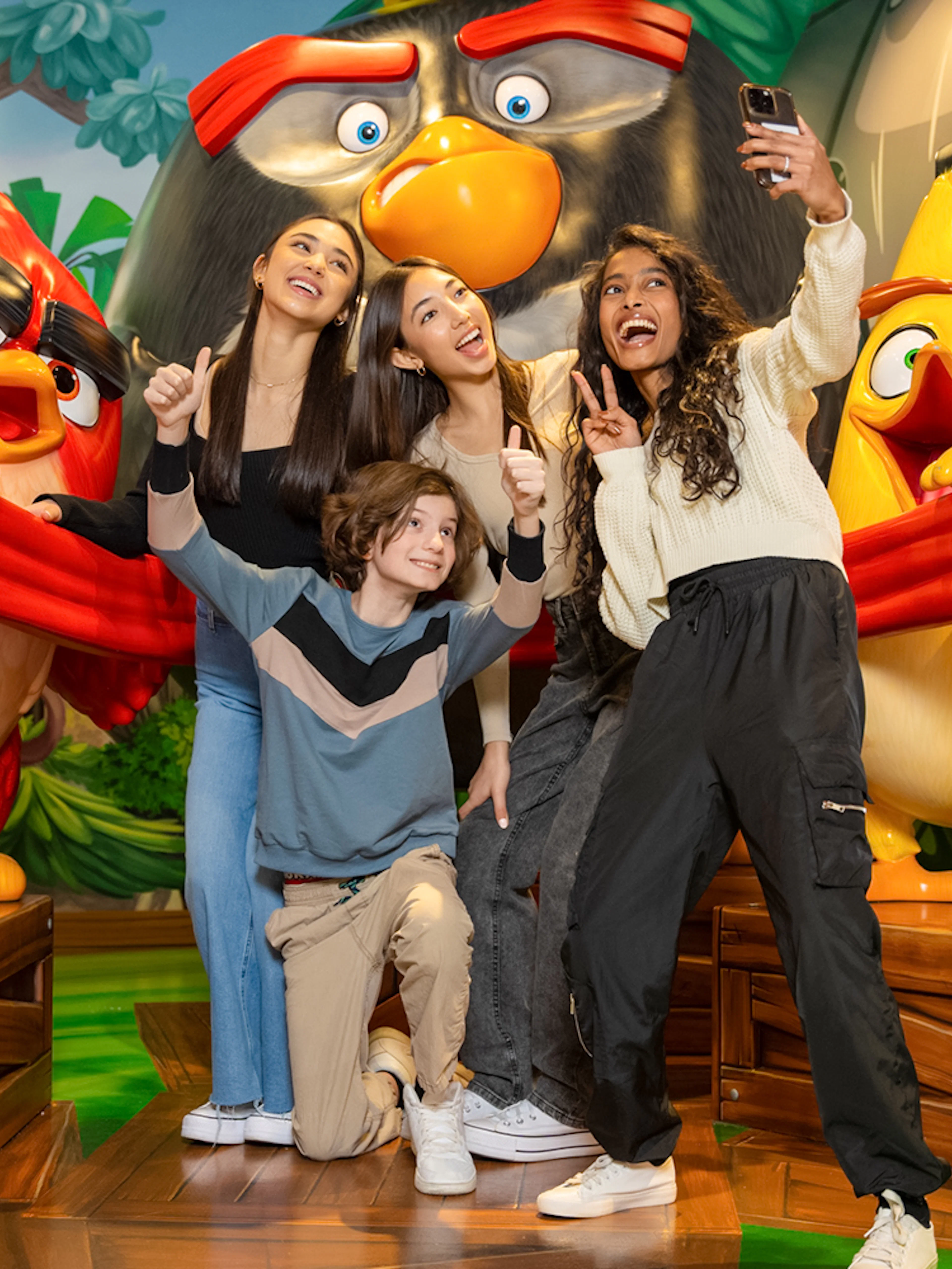 Group posing with Angry Birds characters at Angry Birds Mini Golf, American Dream.