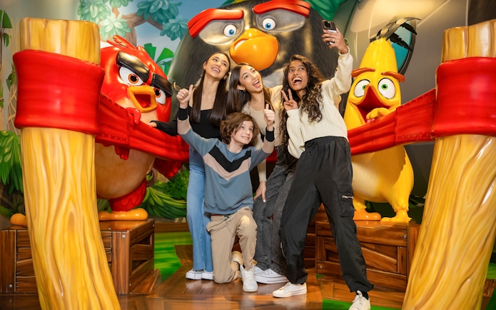 Group posing with Angry Birds characters at Angry Birds Mini Golf, American Dream.